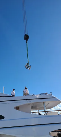 Component handling above a yacht superstructure