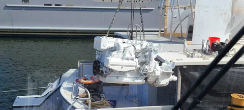 Marine engine handling alongside a yacht