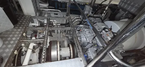 Running gear and machinery inside the engine room