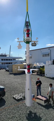 Crane lifting a yacht equipment assembly at the yard