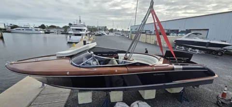 Tender handling alongside the dock
