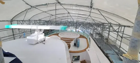 Covered yacht work area and scaffolding