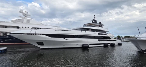 Modern motor yacht berthed alongside the waterfront