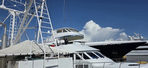 Dockside working area and access alongside a yacht